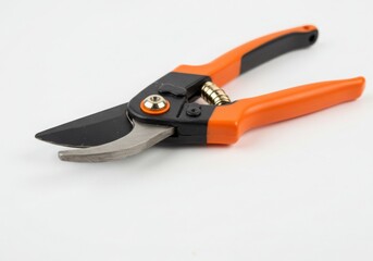 Obraz premium Sharp orange hand pruning shears for garden work