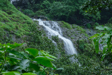 A waterfall during the monsoons near Pune India. Monsoon is the annual rainy season in India from June to September.