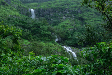 A waterfall during the monsoons near Pune India. Monsoon is the annual rainy season in India from June to September.