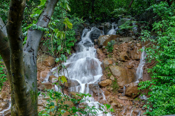A waterfall during the monsoons near Pune India. Monsoon is the annual rainy season in India from June to September.