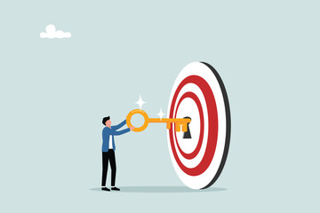 The key to success and achieving business targets, entrepreneurs put the golden key into the right target that is held to open business success.