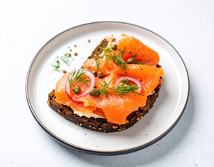Smoked salmon sandwich on dark rye bread