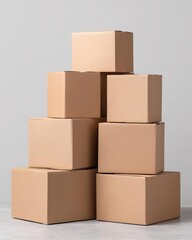 Obraz premium Stacked cardboard boxes on a neutral background for storage needs.