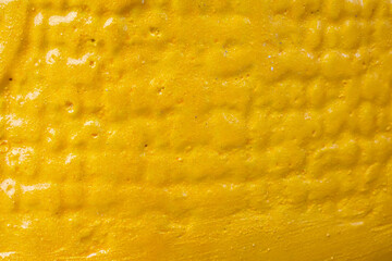 Gold ceramic surface texture background close up