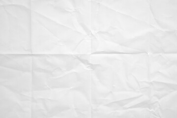 White folded and wrinkled paper texture background