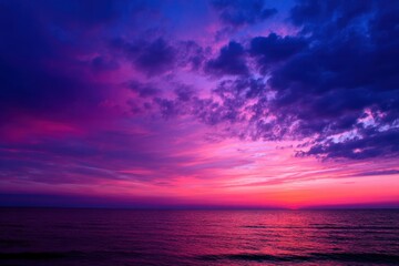 Stunning sunset over the sea with purple and pink sky hues, creating a romantic, serene, and visually captivating scene perfect for travel themes, nature designs, and artistic projects.