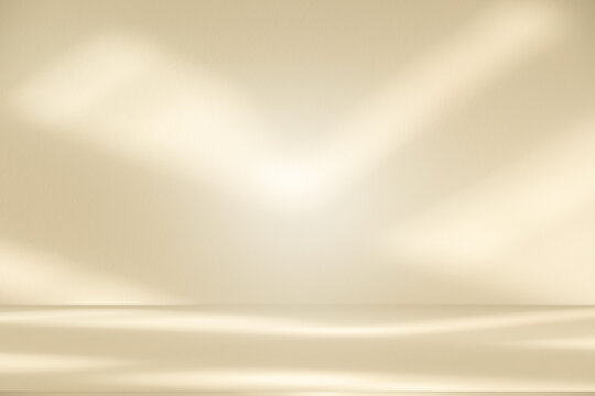 Wall interior background, studio and backdrops show products. with leaf shadow from window color beige and white. background for text insertion and presentation of product	
