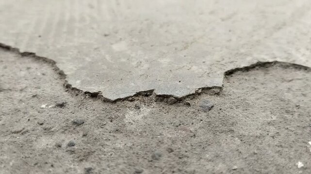 Concrete surfaces are peeling or spalling. due to extreme weather