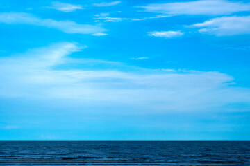 Nature of the ocean and blue sky Summer with sunshine, sandy beaches, clear blue waters sparkling...