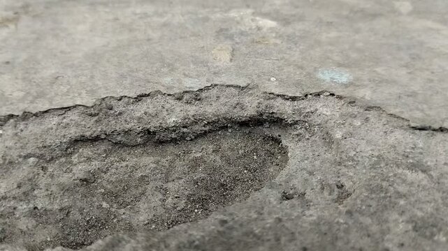 Concrete surfaces are peeling or spalling. due to extreme weather
