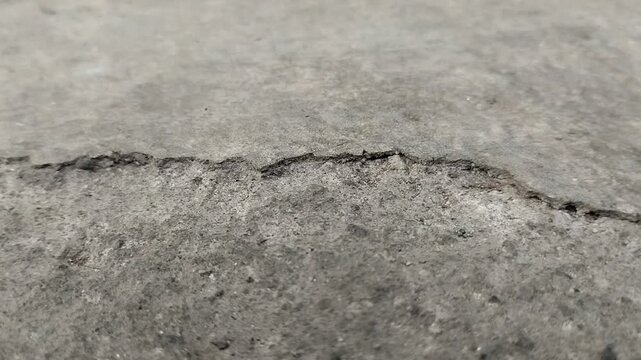Concrete surfaces are peeling or spalling. due to extreme weather