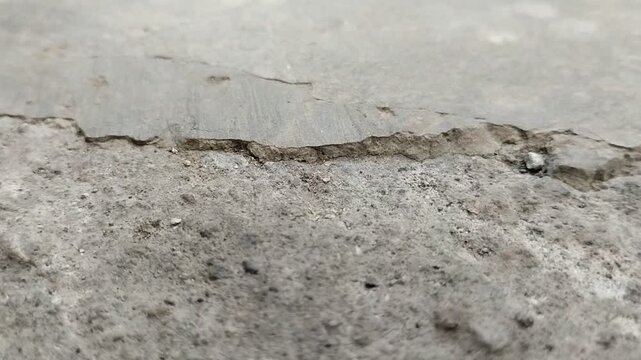 Concrete surfaces are peeling or spalling. due to extreme weather