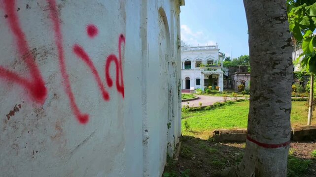 10 Old Zamindar House Front Seen Through Tree and Wall - June 13, 2025, Laksam, Bangladesh
