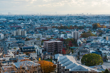 Minoh, Osaka, Japan. A panoramic cityscape view of Minoh and the distant Osaka skyline from a high...