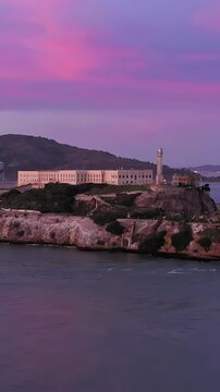 Alcatraz Island, USA, at dusk. The former prison is now a popular tourist destination, with ferries bringing visitors to explore its history and scenic views.