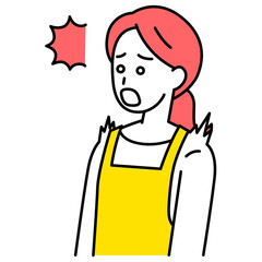 驚くエプロン姿の女性