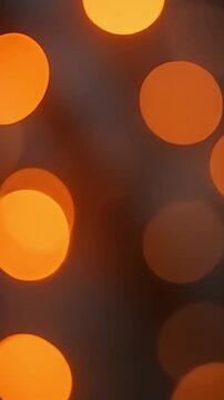 bokeh lights background, smoky gray bokeh, muted orange lights, 4K bokeh loop, seamless flickering lights, abstract bokeh video, cinematic bokeh background, elegant light flicker, soft light