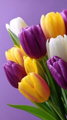 Obraz premium Close-up of a bouquet of tulips in various colors.
