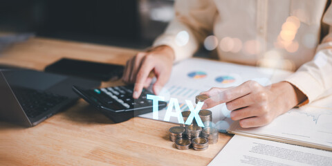 Business people planning annual tax deduction, tax rate calculation, and business financial budget, effective tax deduction planning ideas for individuals and companies,document management system