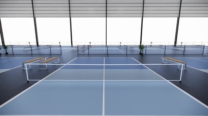 Pickleball tennis courts inside empty warehouse sport complex buildings during the day 4k video
