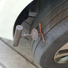 Flat tires, punctured tires, tires with nails, Repair plug being inserted to patch a nail tire...