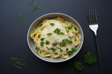 Creamy pasta with parsley and cheese fettuccine creamy sauce