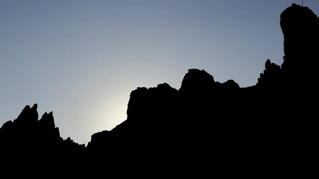 Sunset views on sharp, unusually shaped cliffs and peaks