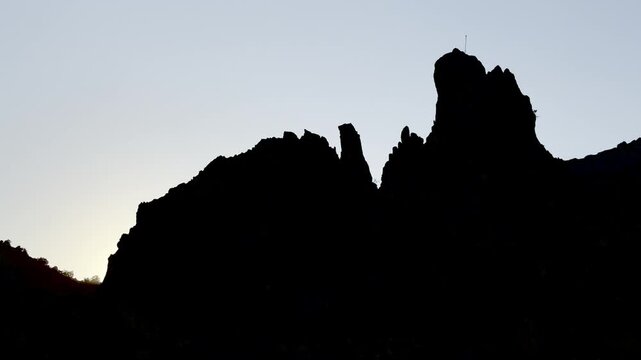 Sunset views on sharp, unusually shaped cliffs and peaks