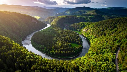 Obraz premium Scenic Aerial View of River Bend in Lush Green Forest.