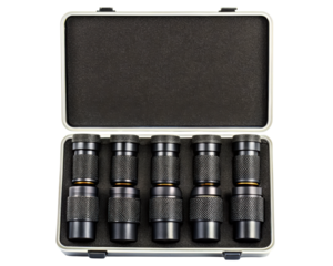 Set of black metal quick couplers in foam-lined storage case on a transparent background
