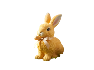 Yellow bunny with peach ribbon isolated on a transparent background image