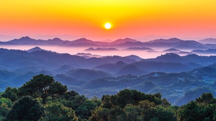 Sunrise Over Mountain Peaks: Witness the awe-inspiring beauty of a vibrant sunrise painting the sky above a majestic mountain range, shrouded in a veil of morning mist.