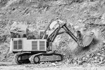 Open pit mine, Excavator in Action at ore industry Site.