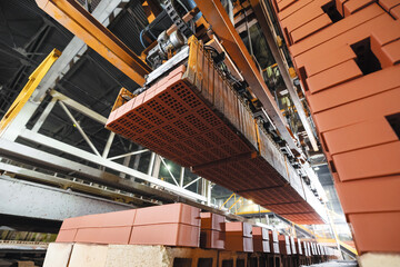 Automated brick production concept. Conveyor process and quality control in modern manufacturing