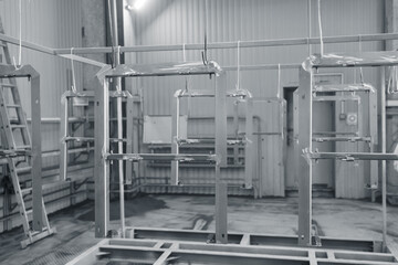 Industrial factory, high volume manufacturing and process structural parts for powder coating