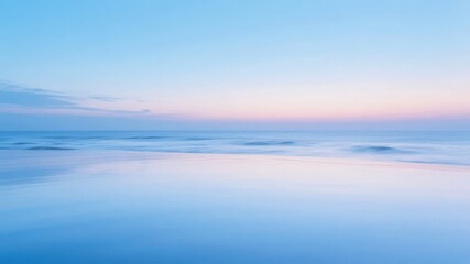 Fototapeta premium Calm Ocean Horizon at Dusk with Soft Blue and Pink Hues