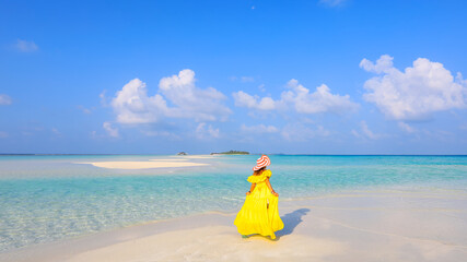 Happy moment freedom lifestyle Relaxation as fresh of summer with young woman in yellow dress  on...