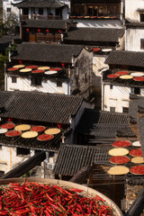Harvest celebration in a Chinese rural village during autumn with traditional architecture