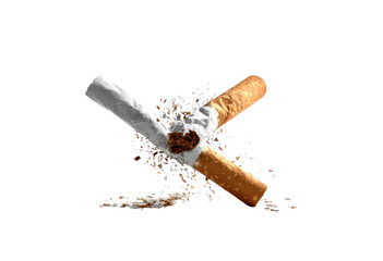 Two crossed cigarettes, broken apart, showing tobacco debris