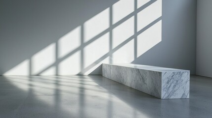 Obraz premium A minimalist white marble bench in a sunlit room.