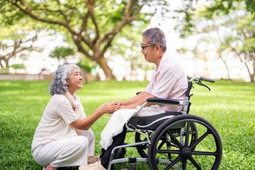 Senior, couple and people with disability in park for fresh air, walking and enjoyment of...