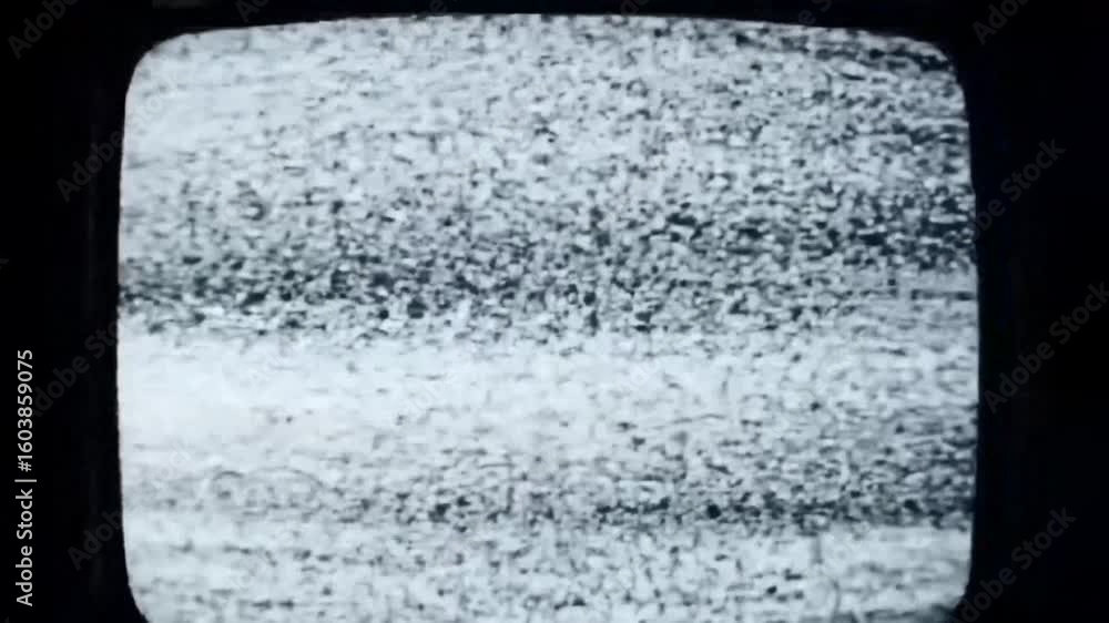 Poster close-up of a vintage television screen displaying static noise, creating a textured, abstract patte