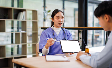 laptop with blank screen a female nurse hold her senior patient's hand. Giving Support. Doctor helping old patient with Alzheimer's disease. Female carer holding hands of senior man