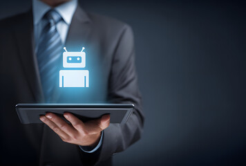 Businessman Holding Tablet with Glowing AI Robot Icon, Futuristic Technology Concept.