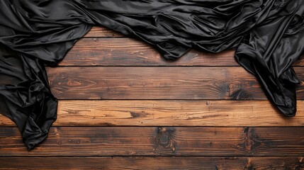 Black Silk Curtain on Wooden Table