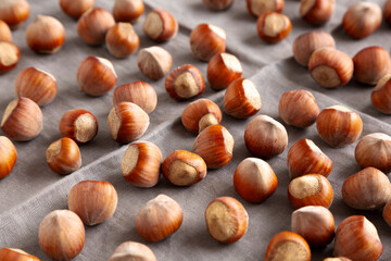 Organic Raw Hazelnuts, side view.