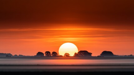 Obraz premium Serene Landscapes Golden Hour Photography, Calm Photography, time passing. Radiant Glow of Golden Hour: Breathtaking Landscape Captured in Warm Sunset Light