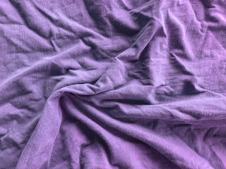 violet fabric background with crumpled texture