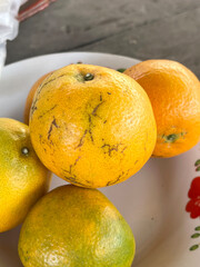 close up view of delicious asian food, orange fruit