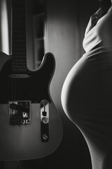 Pregnant Woman with Guitar in Black and White
